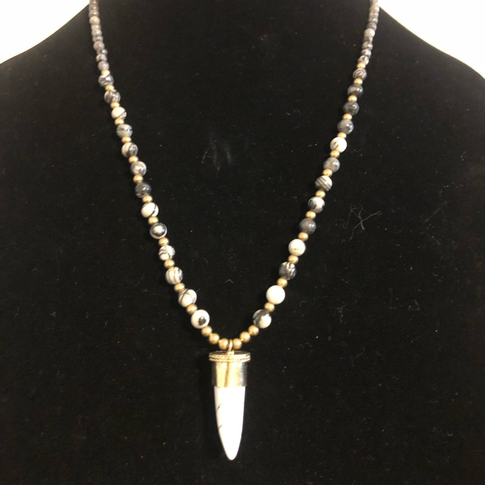 Bone horn pendant with Dalmatian jasper beaded necklace.